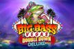 Logo del gioco "Big Bass Vegas Double Down Deluxe" con un grosso pesce al centro, circondato da palme e luci colorate in stile Las Vegas, su sfondo notturno.